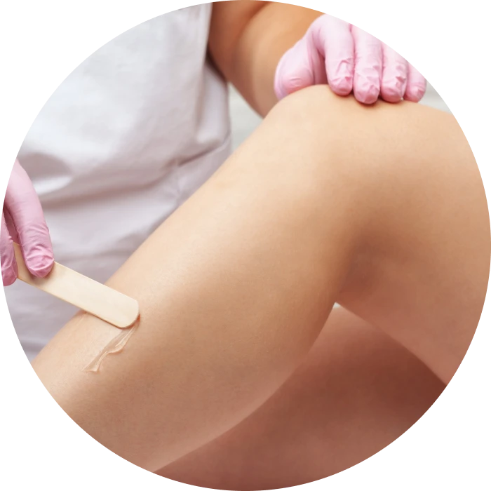 Beauty treatment with wax and gloves