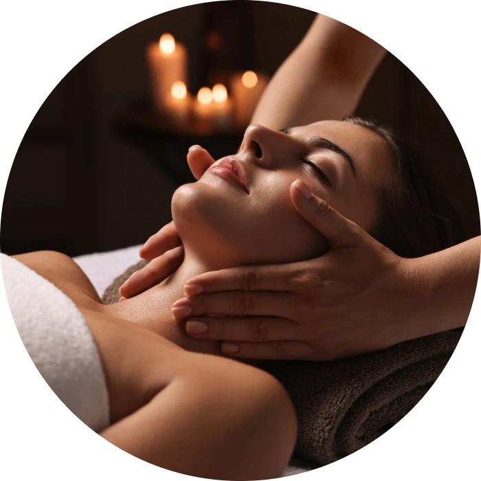 Woman receiving a relaxing face massage